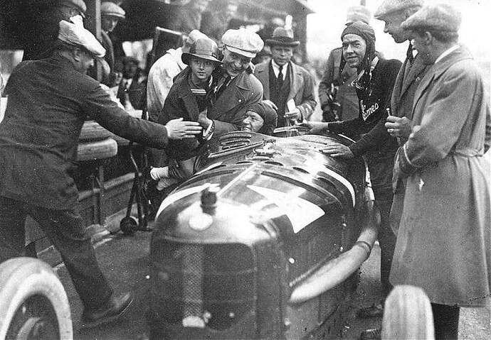 1924 Italian GP : Enzo Ferrari congratulates Antonio Ascari. The kid is Alberto Ascari